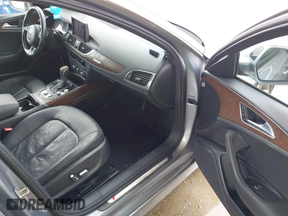 2016 Audi A6 3.0T Premium Plus with VIN WAUFGAFC1GN047352, listed as a IAAI auction lot 41934958 with 111,834 mi miles. Bid and sale history available at carsss.com. Image 5.
