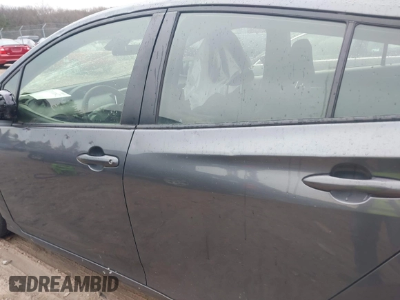 2021 Toyota Prius L Eco with VIN JTDKAMFU6M3140081, listed as a IAAI auction lot 42131187 with 103,973 mi miles and . Bid and sale history available at DreamBid. Image 19.