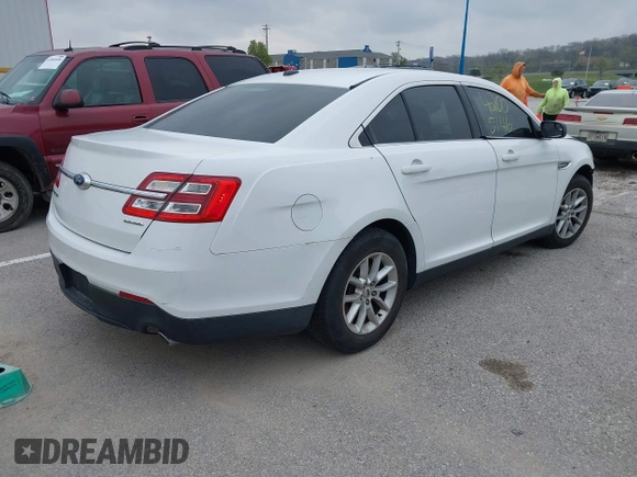 2015 Ford Taurus SE with VIN 1FAHP2D86FG119557, listed as a IAAI auction lot 42005146 with 189,758 mi miles and . Bid and sale history available at carsss.com. Image 4.