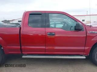 2017 Ford F-150 XL with VIN 1FTEX1E84HKD63147, listed as a IAAI auction lot 41148445 with 106,670 mi miles. Bid and sale history available at carsss.com. Image 14.