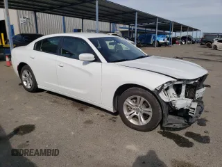 2022 Dodge Charger SXT with VIN 2C3CDXBG9NH212598, listed as a Copart auction lot 52909355 with 66,773 mi miles and Clean Title. Bid and sale history available at DreamBid. Image 4.