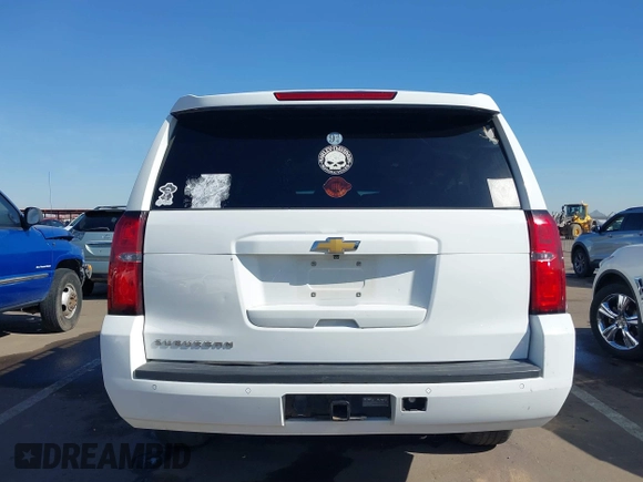 2019 Chevrolet Suburban LT with VIN 1GNSCHKC3KR143942, listed as a IAAI auction lot 41896633 with 153,139 mi miles and . Bid and sale history available at DreamBid. Image 16.