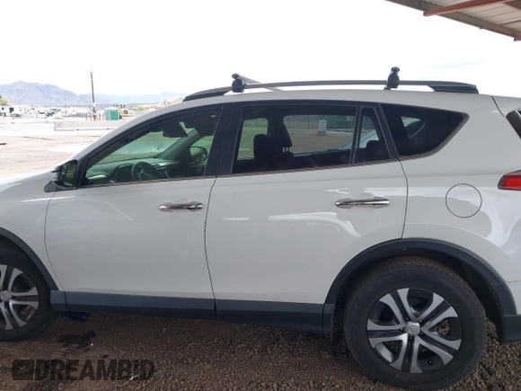2017 Toyota RAV4 LE with VIN JTMZFREV5HJ707504, listed as a IAAI auction lot 41802321 with 63,834 mi miles and . Bid and sale history available at carsss.com. Image 14.
