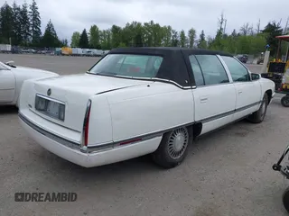 1995 Cadillac DeVille z VIN 1G6KD52B1SU278042, wystawiony jako IAAI lot #42142667 z przebiegiem 79 943 mil mil oraz . Historia ofert i sprzedaży dostępna na DreamBid. Obrazek 4.