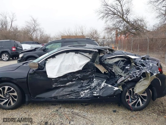2017 Honda Civic Coupe LX-P with VIN 2HGFC4B04HH308187, listed as a IAAI auction lot 41558865 with 97,360 mi miles. Bid and sale history available at carsss.com. Image 6.