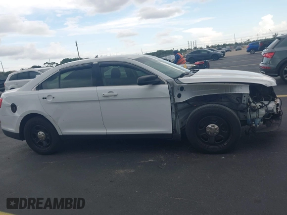 2015 Ford Police Interceptor with VIN 1FAHP2L83FG149326, listed as a IAAI auction lot 42477215 with 90,679 mi miles and . Bid and sale history available at DreamBid. Image 14.