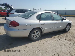 2004 Ford Taurus SE with VIN 1FAFP53U04G133586, listed as a Copart auction lot 59972925 with 228,938 mi miles and Salvage title. Bid and sale history available at DreamBid. Image 3.