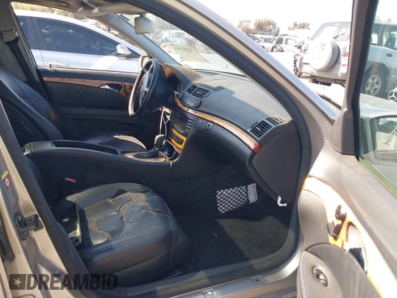 2006 Mercedes-Benz E-Class 3.5L with VIN WDBUF56J96A838185, listed as a IAAI auction lot 41981543 with 213,431 mi miles. Bid and sale history available at carsss.com. Image 5.