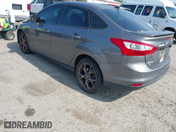 2013 Ford Focus SE with VIN 1FADP3F28DL233822, listed as a IAAI auction lot 42583041 with 135,728 mi miles and . Bid and sale history available at DreamBid. Image 3.