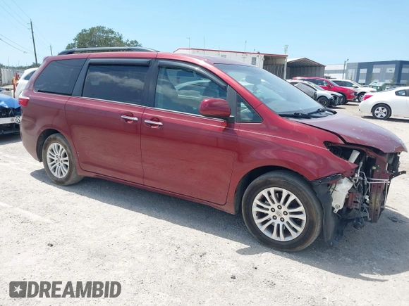 2016 Toyota Sienna XLE with VIN 5TDYK3DC7GS716470, listed as a IAAI auction lot 42177176 with 121,165 mi miles and . Bid and sale history available at DreamBid. Image 1.