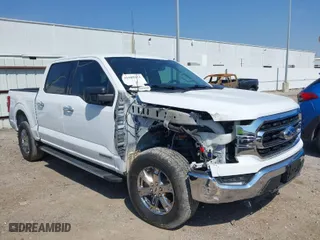 2021 Ford F-150 XL with VIN 1FTFW1ED1MFB26798, listed as a IAAI auction lot 41669211 with 83,284 mi miles. Bid and sale history available at carsss.com. Image 1.