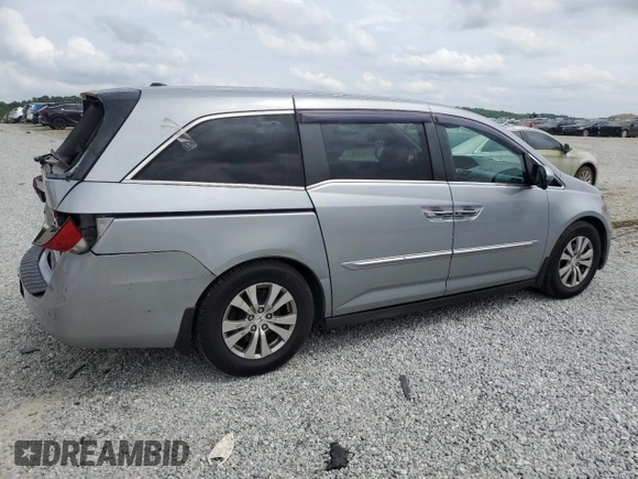 2016 Honda Odyssey EX-L with VIN 5FNRL5H65GB040719, listed as a Copart auction lot 54587295 with 231,302 mi miles and Salvage Title. Bid and sale history available at DreamBid. Image 3.