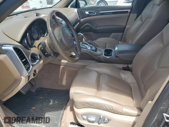 2012 Porsche Cayenne S Hybrid with VIN WP1AE2A24CLA93950, listed as a Copart auction lot 64725885 with Not provided miles and Clean title. Bid and sale history available at DreamBid. Image 7.