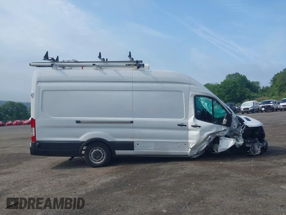 2024 Ford Transit Cargo z VIN 1FTBW3X80RKA42450, wystawiony jako IAAI lot #42317872 z przebiegiem 12 464 mil mil oraz . Historia ofert i sprzedaży dostępna na DreamBid. Obrazek 14.