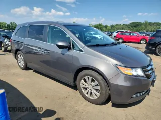 2014 Honda Odyssey EX-L with VIN 5FNRL5H63EB036388, listed as a Copart auction lot 65701425 with 117,636 mi miles and Clean title. Bid and sale history available at DreamBid. Image 4.