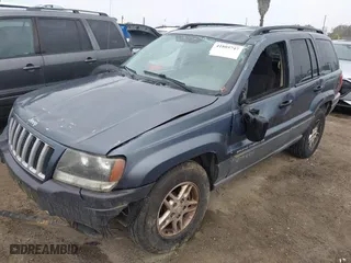 2004 Jeep Grand Cherokee Laredo with VIN 1J4GX48S64C291075, listed as a IAAI auction lot 41805747 with 282,384 mi miles. Bid and sale history available at carsss.com. Image 17.