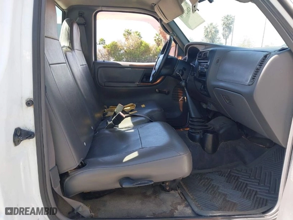 2003 Mazda B-Series 2WD Truck SX with VIN 4F4YR12D53TM11564, listed as a IAAI auction lot 42028399 with 218,402 mi miles. Bid and sale history available at carsss.com. Image 5.
