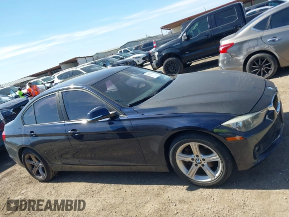 2015 BMW 3 Series 320i with VIN WBA3B1C53FK138310, listed as a IAAI auction lot 41677208 with 57,891 mi miles. Bid and sale history available at carsss.com. Image 13.