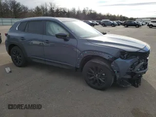 2025 Mazda CX-50 S Select with VIN 7MMVABAMXSN303129, listed as a Copart auction lot 87862825 with 732 mi miles and Salvage Title. Bid and sale history available at DreamBid. Image 4.