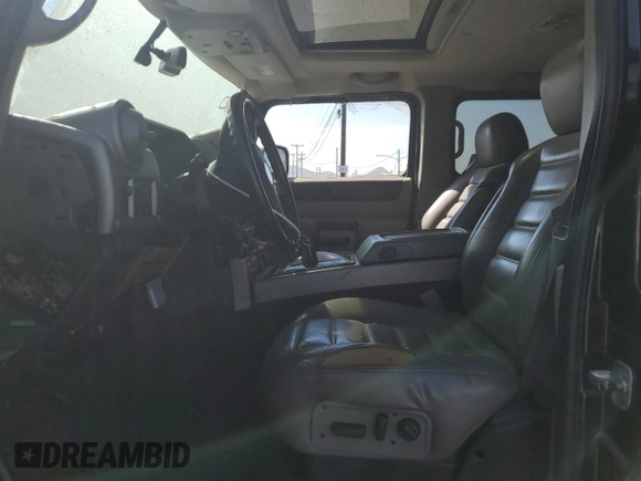 2004 Hummer H2 with VIN 5GRGN23U24H104327, listed as a Copart auction lot 74150914 with 181,933 mi miles and Salvage Title. Bid and sale history available at carsss.com. Image 7.