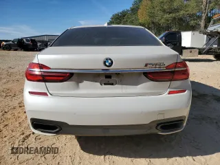 2016 BMW 7 Series 750i with VIN WBA7F0C58GGM20723, listed as a Copart auction lot 80143764 with 102,311 mi miles and Salvage Title. Bid and sale history available at carsss.com. Image 6.