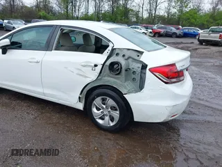 2015 Honda Civic LX with VIN 19XFB2F54FE104574, listed as a IAAI auction lot 42096001 with 122,094 mi miles and . Bid and sale history available at DreamBid. Image 6.