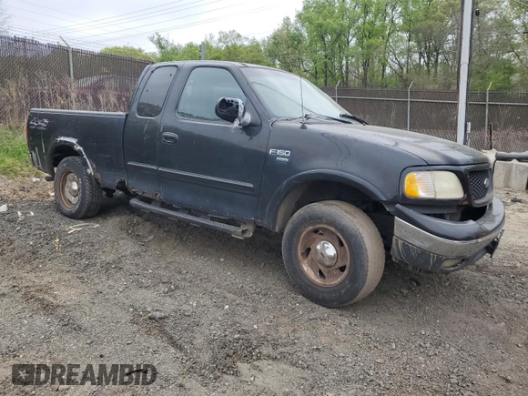 2000 Ford F-150 XL with VIN 1FTRX18W0YNC08668, listed as a Copart auction lot 53636035 with 0 mi miles and Salvage Title. Bid and sale history available at carsss.com. Image 4.