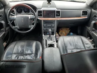 2012 Lincoln MKZ with VIN 3LNHL2JC1CR808663, listed as a Copart auction lot 61001675 with 153,627 mi miles and Salvage title. Bid and sale history available at DreamBid. Image 8.