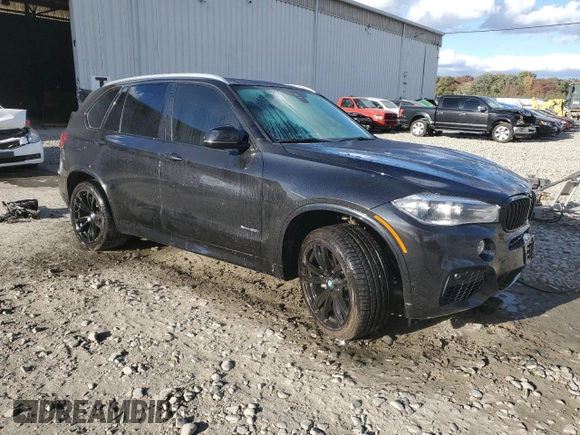 2017 BMW X5 xDrive50i with VIN 5UXKR6C54H0J84099, listed as a Copart auction lot 76269094 with 68,026 mi miles and Salvage title. Bid and sale history available at DreamBid. Image 4.