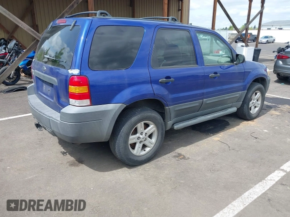 2005 Ford Escape XLT with VIN 1FMYU93195KA35708, listed as a IAAI auction lot 42130239 with 230,920 mi miles. Bid and sale history available at carsss.com. Image 4.