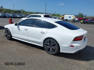 2016 Audi A7 Prestige with VIN WAU2GAFC1GN158272, listed as a IAAI auction lot 42012170 with 99,775 mi miles and . Bid and sale history available at DreamBid. Image 3.