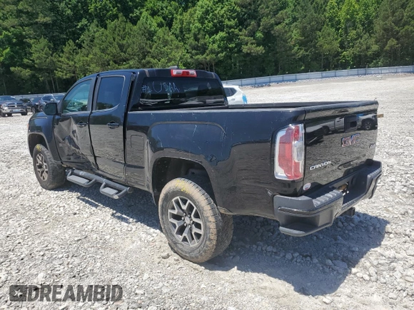 2015 GMC Canyon 4WD SLE with VIN 1GTG6BE32F1115990, listed as a Copart auction lot 71295314 with 118,913 mi miles and Salvage Title. Bid and sale history available at carsss.com. Image 3.