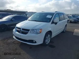 2013 Dodge Grand Caravan Crew with VIN 2C4RDGDG4DR606263, listed as a IAAI auction lot 41898351 with 127,044 mi miles and . Bid and sale history available at DreamBid. Image 2.