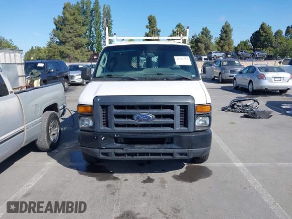 2013 Ford Econoline Cargo Commercial with VIN 1FTNE1EW7DDA98789, listed as a IAAI auction lot 42382594 with 251,602 mi miles and . Bid and sale history available at DreamBid. Image 12.
