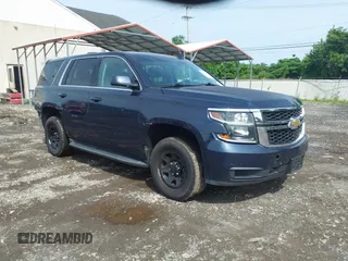 2019 Chevrolet Tahoe Commercial z VIN 1GNLCDEC1KR218436, wystawiony jako IAAI lot #42286365 z przebiegiem 119 981 mil mil oraz . Historia ofert i sprzedaży dostępna na DreamBid. Obrazek 1.