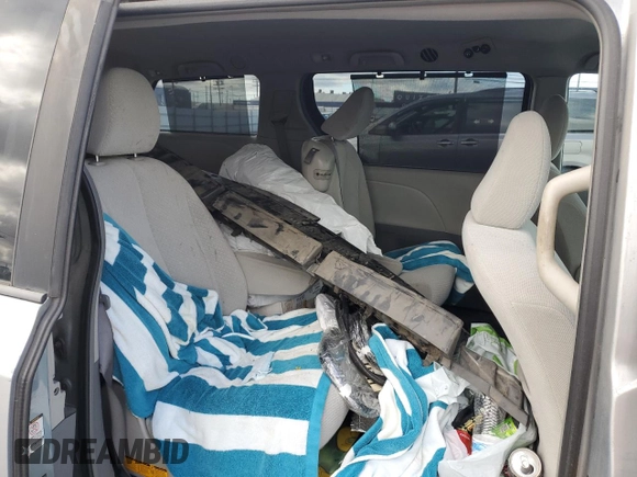 2011 Toyota Sienna LE AAS with VIN 5TDKK3DC3BS112395, listed as a Copart auction lot 48169005 with 179,801 mi miles and Salvage Title. Bid and sale history available at DreamBid. Image 12.