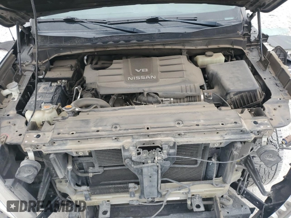 2017 Nissan Titan SV z VIN 1N6AA1EJ2HN538803, wystawiony jako Copart lot #48893625 z przebiegiem 166 415 mil mil oraz Szkoda całkowita • Salvage title. Historia ofert i sprzedaży dostępna na DreamBid. Obrazek 11.