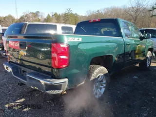 2015 Chevrolet Silverado 1500 LT with VIN 1GCRCREHXFZ267054, listed as a IAAI auction lot 41543297 with 134,087 mi miles. Bid and sale history available at carsss.com. Image 4.
