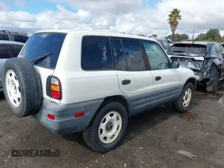 1999 Toyota RAV4 with VIN JT3GP10V9X0041656, listed as a IAAI auction lot 41447012 with 8,845 mi miles and . Bid and sale history available at DreamBid. Image 4.