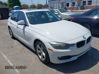2013 BMW 3 Series 328i with VIN WBA3A5C55DF358287, listed as a IAAI auction lot 42027372 with 149,981 mi miles. Bid and sale history available at carsss.com. Image 1.