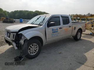 2014 Nissan Frontier SV with VIN 1N6AD0FV1EN734214, listed as a Copart auction lot 59261715 with 114,413 mi miles and Salvage title. Bid and sale history available at DreamBid. Image 1.