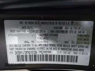 2015 Mazda 3 i Touring with VIN 3MZBM1V72FM215729, listed as a IAAI auction lot 42191673 with 141,471 mi miles and . Bid and sale history available at DreamBid. Image 9.