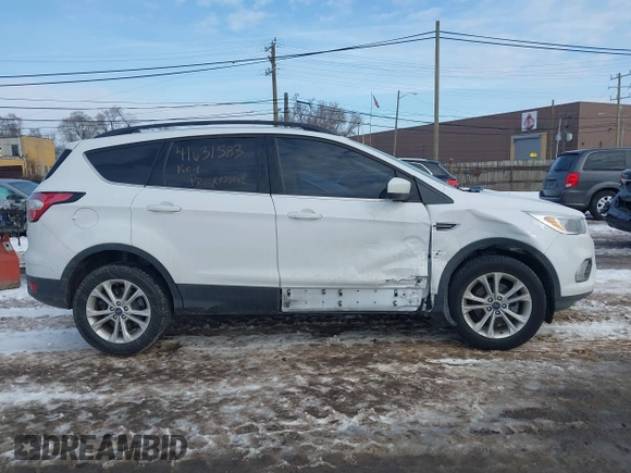 2018 Ford Escape SE with VIN 1FMCU0GD1JUC48757, listed as a IAAI auction lot 41631583 with 80,700 mi miles. Bid and sale history available at carsss.com. Image 13.