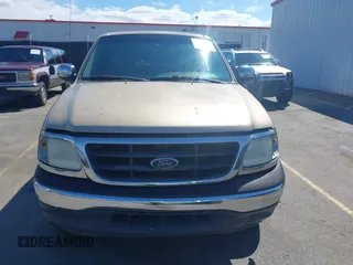 2000 Ford F-150 XL z VIN 1FTRX17L8YNB02069, wystawiony jako IAAI lot #41813272 z przebiegiem 279 042 mil mil oraz . Historia ofert i sprzedaży dostępna na DreamBid. Obrazek 12.
