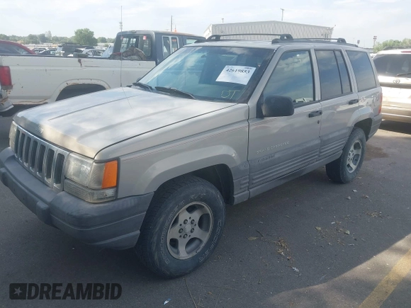 1998 Jeep Grand Cherokee Laredo with VIN 1J4GZ58S6WC319265, listed as a IAAI auction lot 42619853 with 238,667 mi miles and . Bid and sale history available at DreamBid. Image 2.
