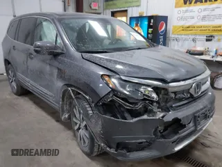 2020 Honda Pilot EX-L z VIN 5FNYF6H59LB034464, wystawiony jako IAAI lot #41649437 z przebiegiem 57 820 mil mil oraz . Historia ofert i sprzedaży dostępna na DreamBid. Obrazek 1.