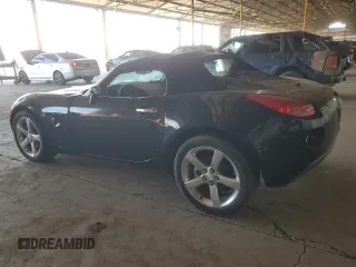 2006 Pontiac Solstice z VIN 1G2MB33B96Y107184, wystawiony jako Copart lot #74216894 z przebiegiem 190 765 mil mil oraz Czysty tytuł • Clean title. Historia ofert i sprzedaży dostępna na DreamBid. Obrazek 2.