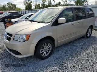 2014 Dodge Grand Caravan SXT z VIN 2C4RDGCG8ER266814, wystawiony jako Copart lot #52053155 z przebiegiem 279 551 mil mil oraz Tytuł czysty. Historia ofert i sprzedaży dostępna na DreamBid. Obrazek 1.