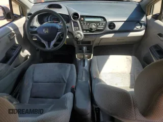 2010 Honda Insight EX with VIN JHMZE2H79AS023173, listed as a Copart auction lot 58087275 with 216,322 mi miles and Salvage title. Bid and sale history available at DreamBid. Image 8.