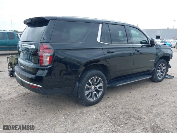 2023 Chevrolet Tahoe LS with VIN 1GNSCMKD9PR157174, listed as a IAAI auction lot 40299056 with 25,588 mi miles. Bid and sale history available at carsss.com. Image 4.